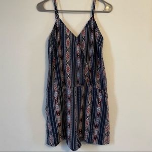 Hem & Thread romper, size medium. Adjustable straps, snap front.